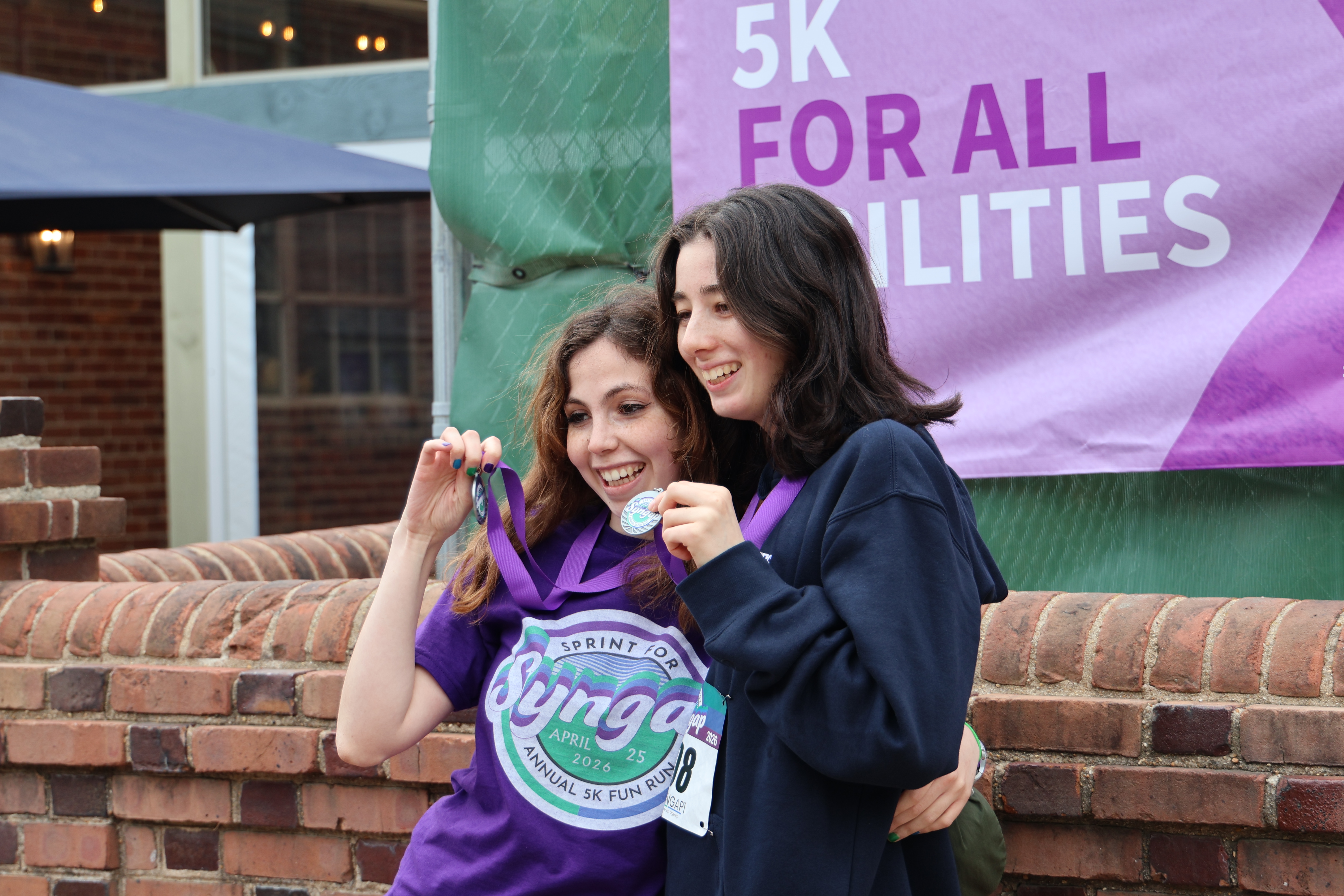 Race-day moment from the 2026 Mora and Qusay 5K